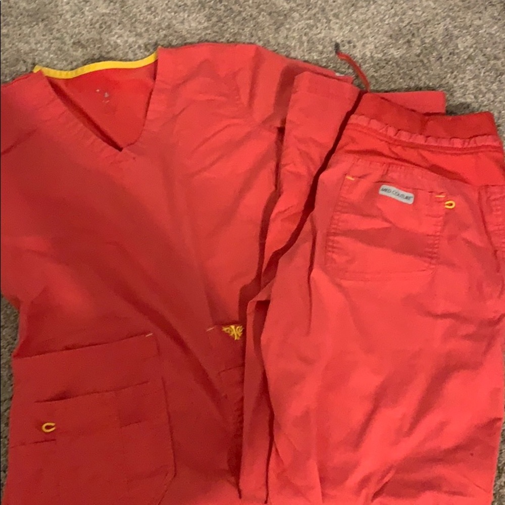 Coral colored Med Couture scrubs